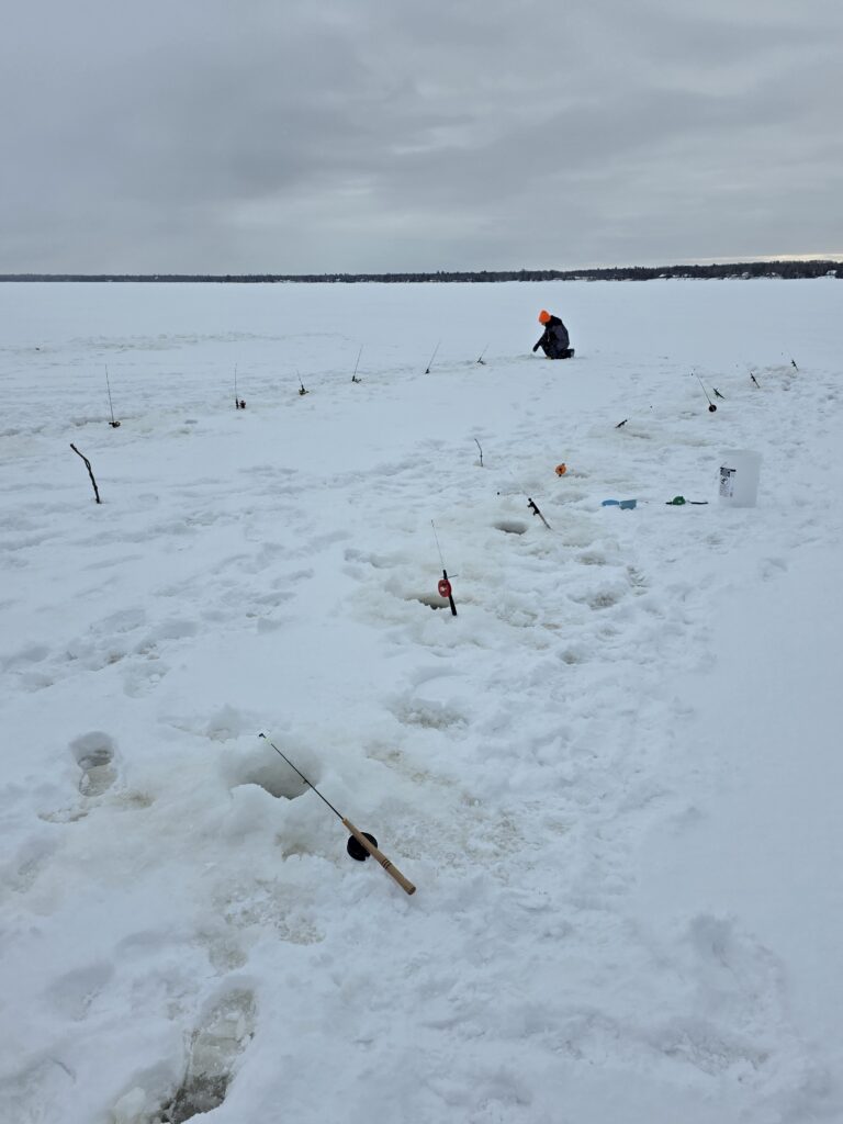 February 23, 26, and 27 students and staff at Ojibwe Charter School participated in an ice fishing field trip coordinated by the Inter-Tribal Council of Michigan and Bay Mills Indian Community Biological Services at Waiska Bay with support from the NOAA B-WET program to learn about ice fishing traditions and local watersheds.